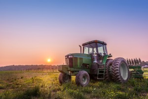 Farm and ranch supplies - Tractor at sunrise.